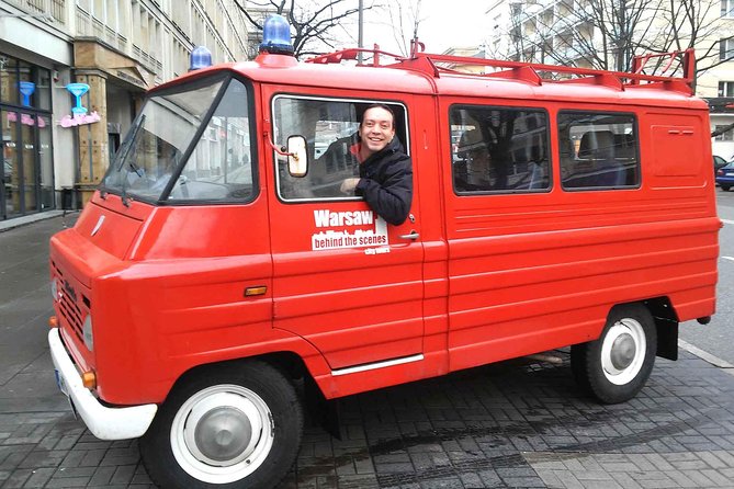Best of Warsaw - private tour by retro minibus with hotel pickup - Praga Polnoc: Crossing the Vistula to the District That Survived