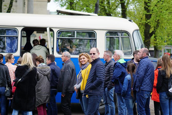 Discover the Dark Side of Warsaw in Praga District by Retro Bus - The Early Warsaw Stories: Date Palm, WWII Basements, and Euro 2012