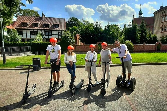 Electric Scooter Tour: Old Town Tour - 1,5-Hour of Magic! - The Little Insurgent and Canaletto’s Sigismund’s Column painting