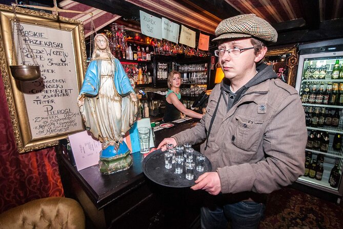Evening Warsaw - pub and history tour with hotel pickup - Nowy Świat and the Pavilions: your first vodka shot in a student-turned-party zone
