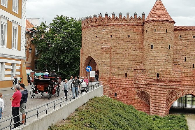 Half-Day Warsaw Layover Tour by Minivan with Airport Pickup - Old Town: UNESCO Streets with Chopin and Curie Footsteps