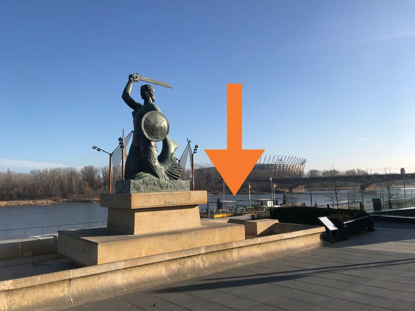 Warsaw: Evening Vistula Cruise with Welcome Drink - The Port of Prague entrance and the hidden working-city feeling