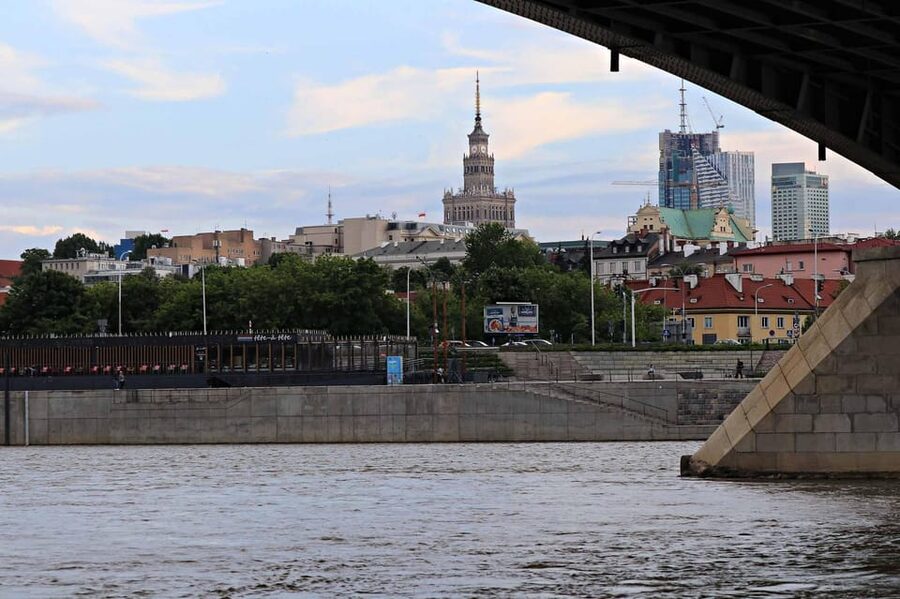 Warsaw: Vistula River Cruise with Your Music & City Views - Boat style, small-group energy, and how the guide shapes the trip